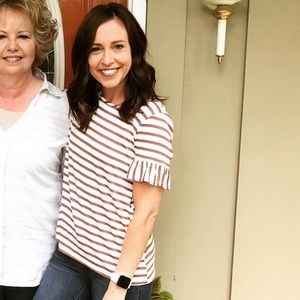 Short sleeved, brown and white striped top. Size XS.